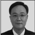 A black and white photo of an asian man.